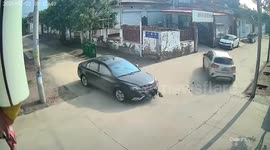 Collision sends car drifting perfectly through village gate in China