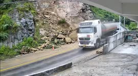 Landslide crashes onto Chinese highway just moments after fuel tanker passes