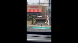 Flood turns parking lot into communal swimming pool for kids in the Philippines