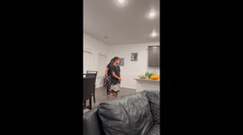 Boy dramatically leaps over couch during trend challenge in Dallas, Texas, USA