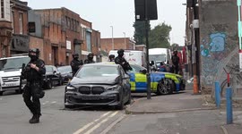 Heavily armed police swarm Birmingham city centre street as public told to move away from the area