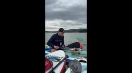 Barbequing Sausages On Stand Up Paddleboards