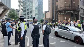 A protester who is against  Illegal immigrants being housed at the Britannia International Hotel gets angry at being labelled as a far-right protester