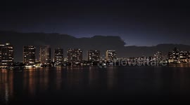 Lightning strikes illuminate dark clouds in time-lapse over Sunny Isles Beach, Florida