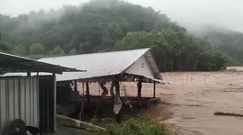 Riverside restaurant washed away by floods in northern Thailand