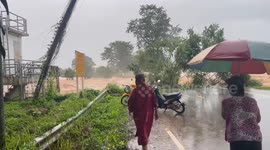 Electricity pulled down as flash floods hit northern Thailand