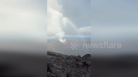 Rainbow forms over lava fountains as volcano erupts in Hawaii