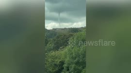 Tornado spotted twisting above British village