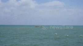 Philippines: Local Fisher folk bring their motorized fishing boat to safe place due to Southwest Monsoon