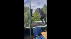 Jumping Men Tip Over Trampoline