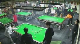 Pool player accidentally pockets a ball in another man's jacket