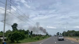 Smoke rises from petrol station following Cambodian rocket strike in Thailand