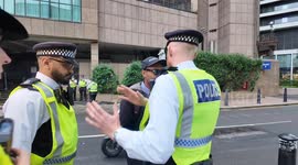 Outside the Britannia International Hotel Illegal Immigration protest a guy try’s to upset protestors with images of Jimmy Savile and Prince Andrew