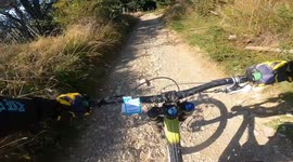 Boy's bicycle ride on a rough path ends in a crash but he escapes unhurt