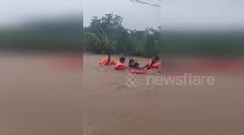 Rescue teams save two children from Typhoon Co-may floods