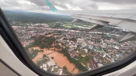 Widespread flooding seen from the air across northern Thailand