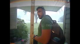 Waiting for son's umbrella, dad  narrowly escapes lightning bolt