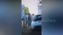 Two injured as driver forgets handbrake and frantically chases rolling car