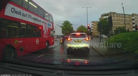 Reckless mopeds cause havoc as they jump red lights and almost hit pedestrian in London