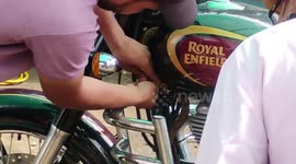 Service center visit turns into snake rescue drama as Russell's viper found beneath bike seat