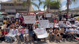 Palestinian children in West Bank hold demonstration to urge Israeli attacks to be stopped
