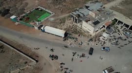 DRONE - Displaced families flee from Suwayda to Daraa amid intensifying clashes in Syria