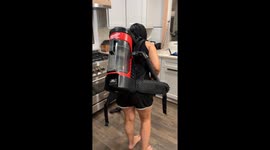 Cleaning the Kitchen With a Backpack Vacuum