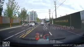 Scooter collides with stopped scooters at U-turn in Sichuan, China