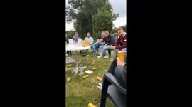 Wrestling Leap Onto Seated Friend