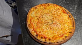 Wood-Fired Pizza at the German Christmas Market – A Cheesy Surprise!