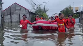 Philippines: Coast Guard Pushes Rescue Boats Through Flooded Streets To Save Stranded Residents In Apalit