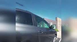 US: Officer Smashes Window To Rescue Child Trapped In Sweltering Car