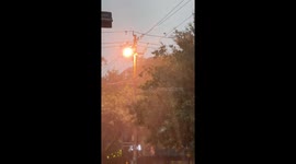 Electrical tower sparks and heavy rain captured during storm in Shandong, China