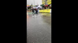 Unauthorized cyclist stopped near Tour de France finish line in Valence, France