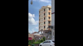 Building demolition mishap with excavator in Guangxi, China