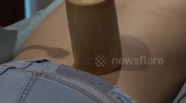 Chinese cupping therapy uses bamboo instead of glass cups in this Thai clinic