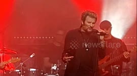 Look-alike of Johnny Hallyday. Concert Les Vieilles Canailles. Obernai, eastern France,Alsacia, near Strasbourg. 26 July 2025