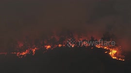 DRONE - Firefighters work to contain massive wildfire in Bursa, Türkiye