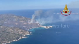 Italy: Fire crews battle wildfire near tourist hotspot on Italy's Sardinia Island