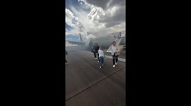 Landing gear fire prompts emergency evacuation at airport in Denver, Colorado