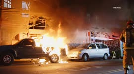US, Los Angeles: East Hollywood Auto Fire Next to Building Under Renovation