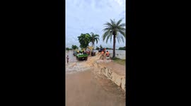 Rescue teams aid locals as flood defences break in Thailand