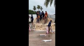 Thai rescue teams evacuate locals as they battle to stem floods
