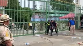 Cambodian workers surge through border crossing as they return home