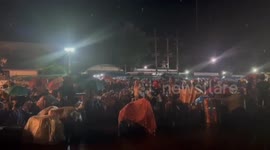 Tens of thousands of Cambodian workers surge through border to leave Thailand