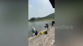 Angler lands 50lb catch bare-handed after rod snaps twice in fishing contest