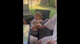 Little girl joyfully dances to Bob Marley in Sotogrande, Spain