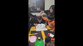 Child accidentally smashes own face in cake during birthday prank in Coronel, Chile