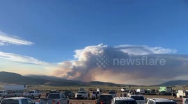 US: TIMELAPSE - Wildfire in Monroe Canyon produces massive smoke clouds