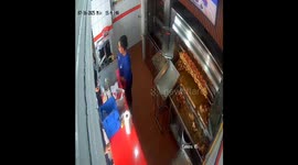Fast food crew member slips and falls while carrying food in Puerto Vallarta, Mexico